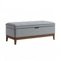 Banc coffre 120 x 45 x 48 cm en tissu gris avec piètement en bois - rangement capitonné moderne